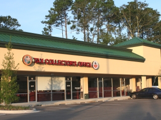 A picture of the front of the Hogan Tax collector office.